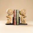 gold angel bookends with books