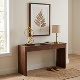 gold love sculpture on wooden console table