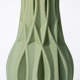 green vase ribbed texture detail