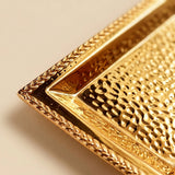 hammered gold tray edge closeup