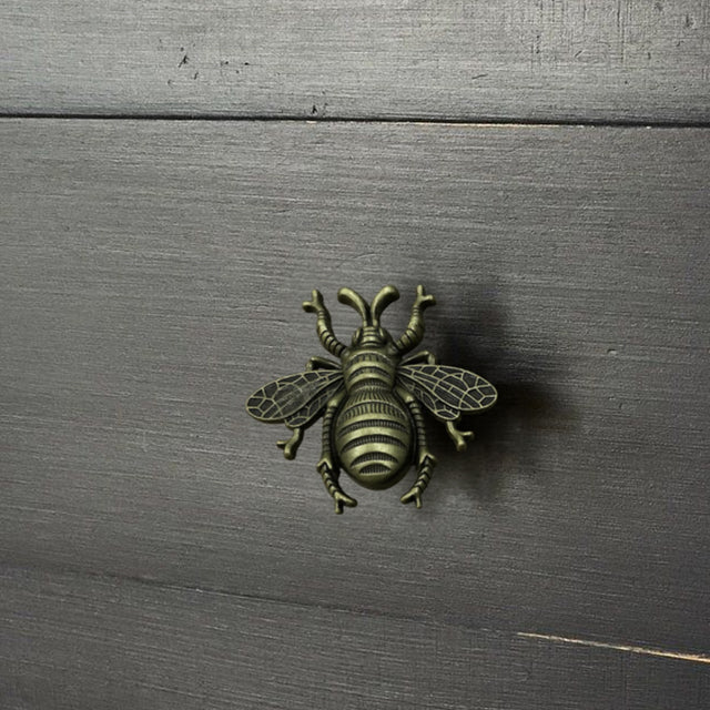 handle on dark cabinet