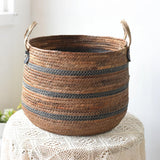 handwoven banana rope storage basket with two handles