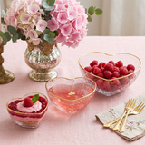 heart shaped glass bowls with raspberries and drink