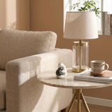 hugging bear figurine on marble side table
