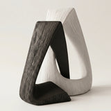 intertwined black white resin sculpture