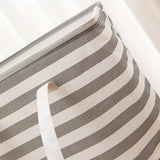 large gray foldable laundry basket with easy carry handles details