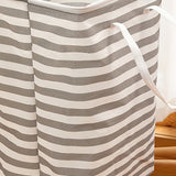 large gray foldable laundry basket with easy carry handles details