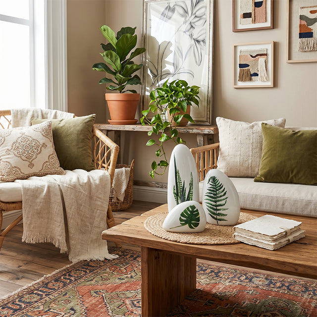 leaf print ceramics on rustic wooden coffee table