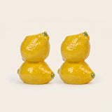 lemon candle holder pair on white background
