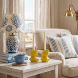 lemon candle holders on coastal side table