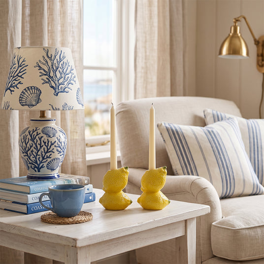 lemon candle holders on coastal side table