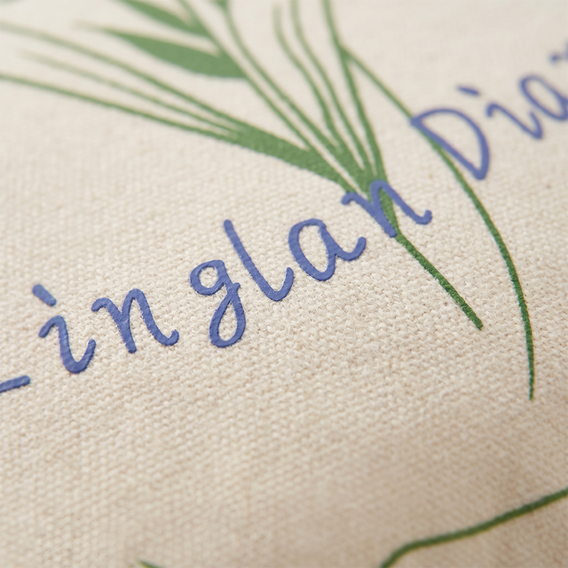 macro shot of blue embroidered text