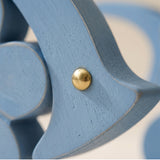 macro shot of blue wooden fish golden eye