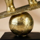 macro shot of golden balancing ball texture