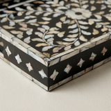 macro shot of pearl inlay tray corner detail