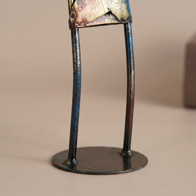 metal sculpture closeup legs and base
