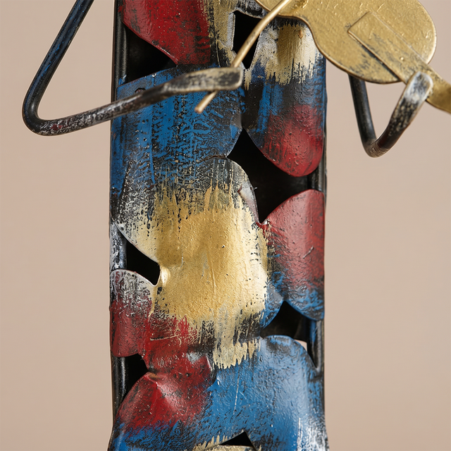 metal sculpture detail colorful textured body