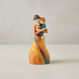 mother child figurine on white background
