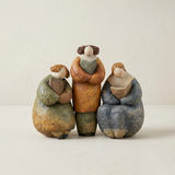 pebble figurine set on plain background