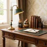 pebble figurines on desk with lamp