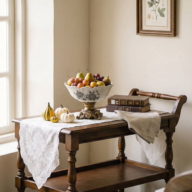 pedestal bowl with fruit on side table