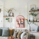 pink fabric storage bag on the wall