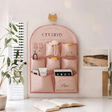 pink fabric wall-mounted storage bag