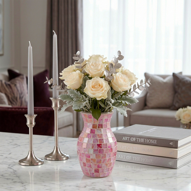 pink mosaic vase with white roses on marble