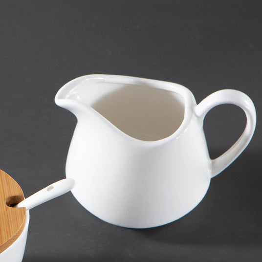 pure white ceramic sugar jar and creamer set details