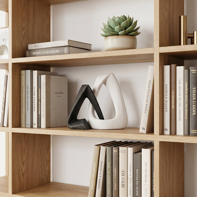 resin sculpture on bookshelf decor