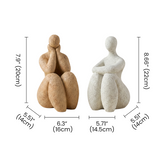 seated human sculptures