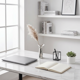silver petal vase with pampas on desk