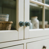 single-hole-ceramic-handle-for-cabinet-or-drawer-scene-05263