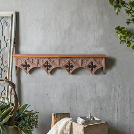 solid wood floating wall shelf on the wall 