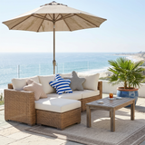 starfish pillows on outdoor coastal patio sofa