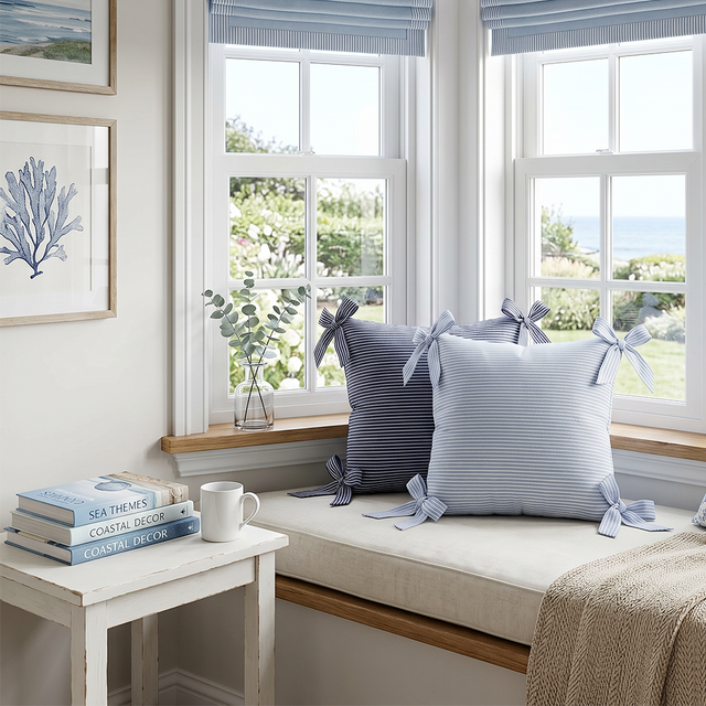 striped bow pillows on coastal window bench seat
