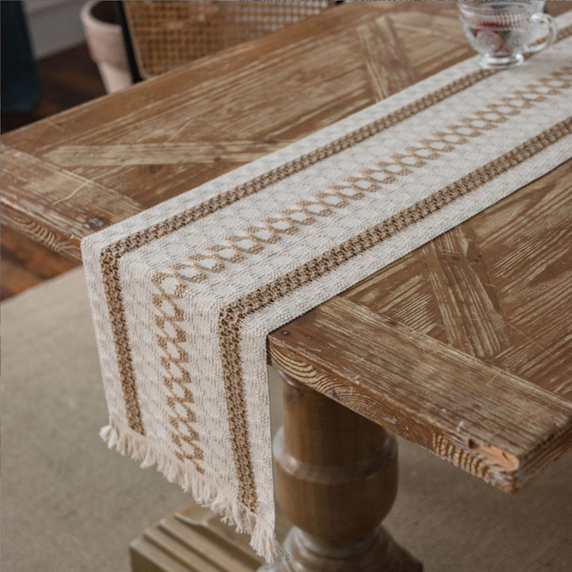 table runner draped over a dinning table