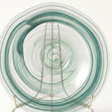 teal round glass plate front view on metal stand