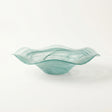 teal wavy glass bowl side view close up