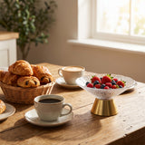 textured glass gold base fruit bowl with strawberries on breakfast table
