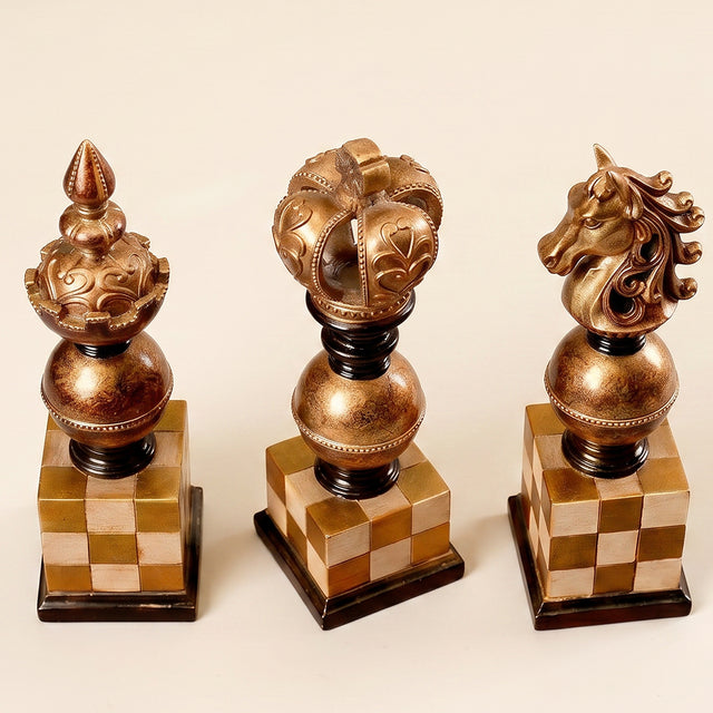 three chess piece decorations standing together