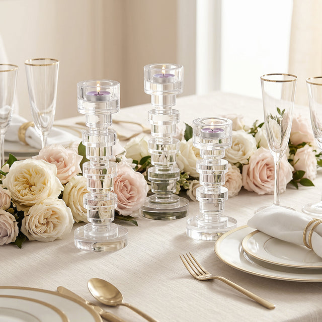 three crystal candle holders on romantic dining table