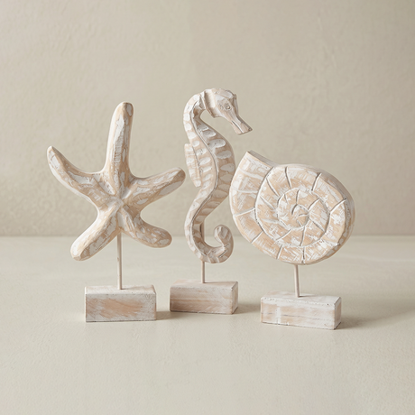 three distressed wood ocean decor figurines