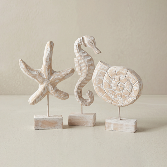 three distressed wood ocean decor figurines