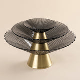 three stacked black bowls