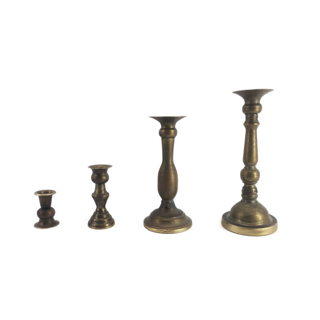 three vintage gold candlesticks