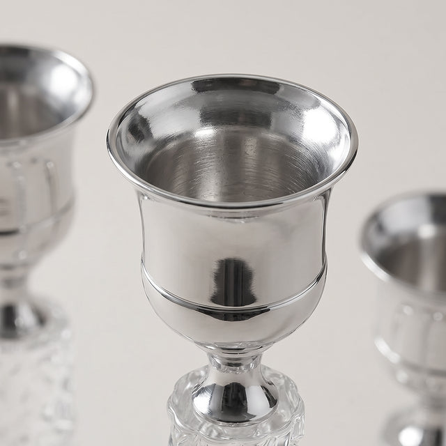 top view of silver candle holder cup