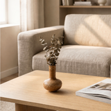 vase on side table near sofa