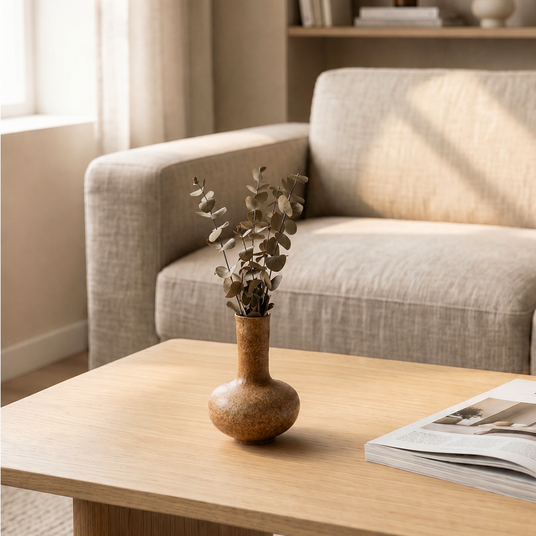 vase on side table near sofa