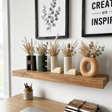 vase on white desk with decor